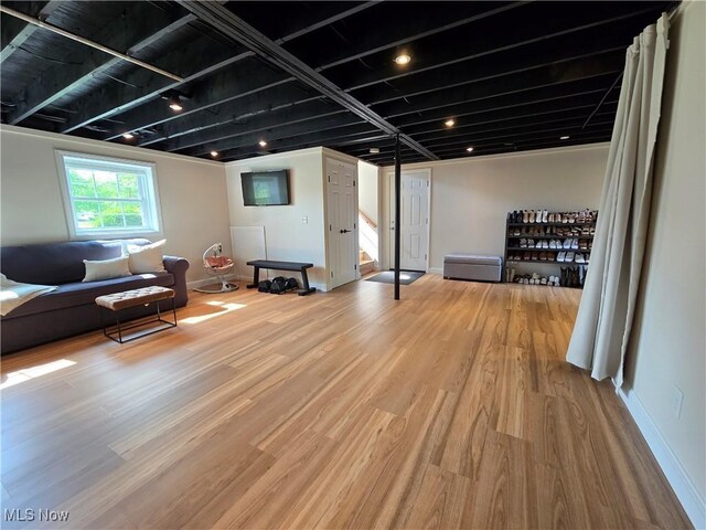 16535 Hosmer Rd, Middlefield, OH 44062 - living room featuring wood finished floors and stairway