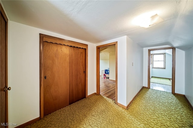 24270 Glenforest Rd, Euclid, OH 44123 - hallway with light carpet and vaulted ceiling