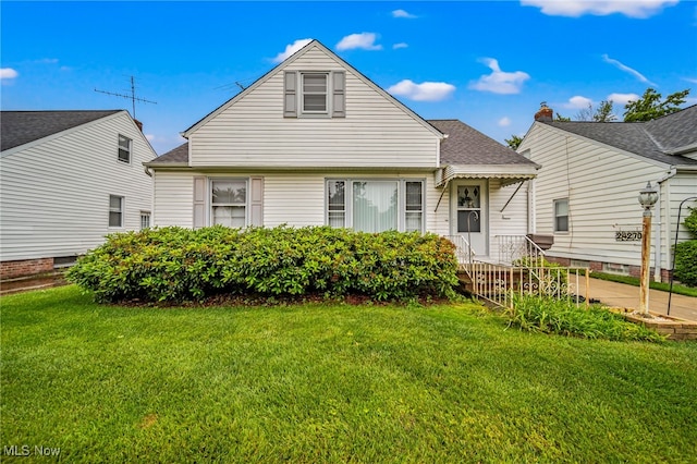 24270 Glenforest Rd, Euclid, OH 44123 - back of property with a lawn and roof with shingles