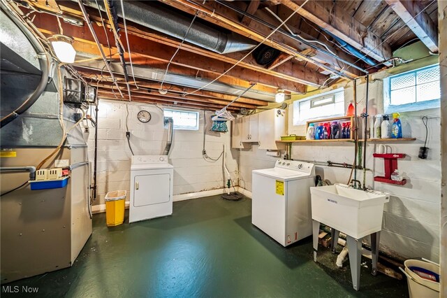 24270 Glenforest Rd, Euclid, OH 44123 - below grade area featuring washing machine and dryer and healthy amount of natural light