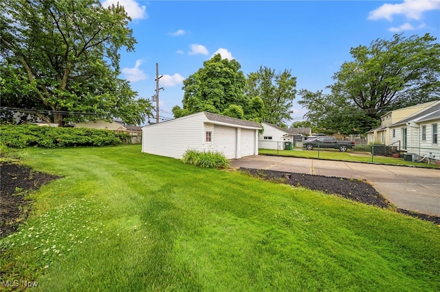 24270 Glenforest Rd, Euclid, OH 44123 - view of yard with an outdoor structure and a detached garage