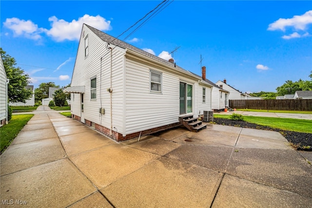24270 Glenforest Rd, Euclid, OH 44123 - rear view of property featuring entry steps and a patio