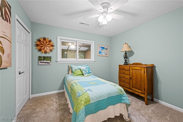 7152 Rippling Brook Ln, Concord, OH 44060 - bedroom with carpet, a closet, ceiling fan, and a textured ceiling