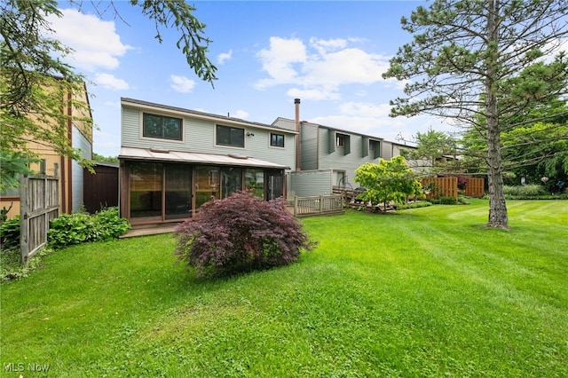 7152 Rippling Brook Ln, Concord, OH 44060 - rear view of property with a sunroom