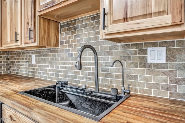 397 Furnace Rd, Conneaut, OH 44030 - kitchen view of butcher block countertops and backsplash