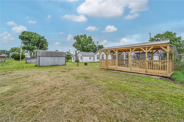 397 Furnace Rd, Conneaut, OH 44030 - view of grassy yard featuring a storage unit