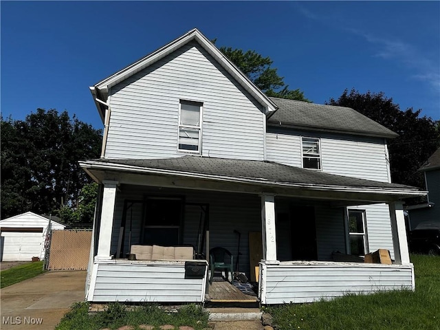 872 Keeney St, Akron, OH 44310 - view of front of home featuring covered porch and an outdoor structure
