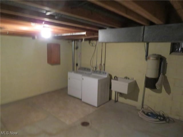 1609 S Main St Unit 22C, North Canton, OH 44709 - finished below grade area with washing machine and clothes dryer and a sink
