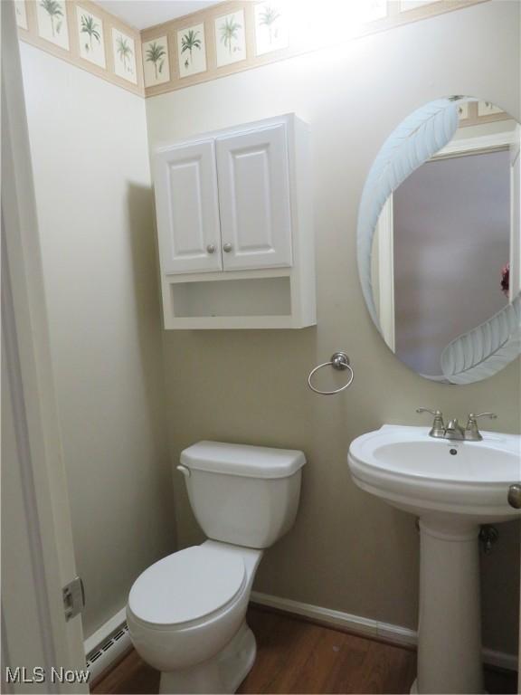 1609 S Main St Unit 22C, North Canton, OH 44709 - half bath with baseboard heating and wood finished floors