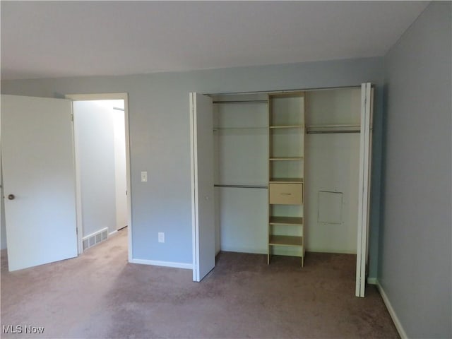 1609 S Main St Unit 22C, North Canton, OH 44709 - unfurnished bedroom featuring carpet and a closet