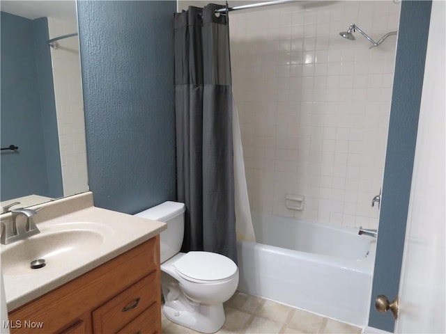 1609 S Main St Unit 22C, North Canton, OH 44709 - bathroom with vanity, shower / bath combo, and a textured wall