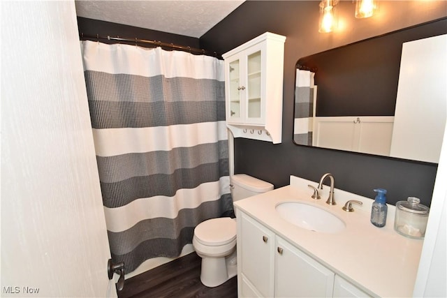 8025 Wadsworth Rd, Wadsworth, OH 44281 - bathroom with vanity, wood finished floors, and a shower with curtain