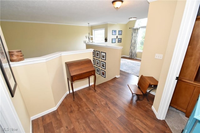 8025 Wadsworth Rd, Wadsworth, OH 44281 - hall featuring an upstairs landing, dark wood finished floors, and ornamental molding