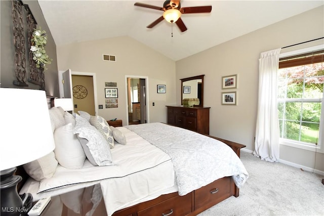 8025 Wadsworth Rd, Wadsworth, OH 44281 - bedroom featuring vaulted ceiling, light colored carpet, multiple windows, a ceiling fan, and ensuite bathroom