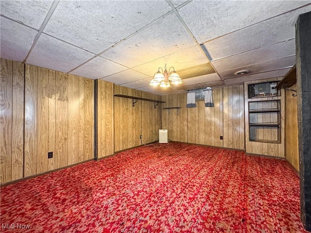 7918 State Route 164, Lisbon, OH 44432 - finished basement featuring a paneled ceiling, wooden walls, and carpet