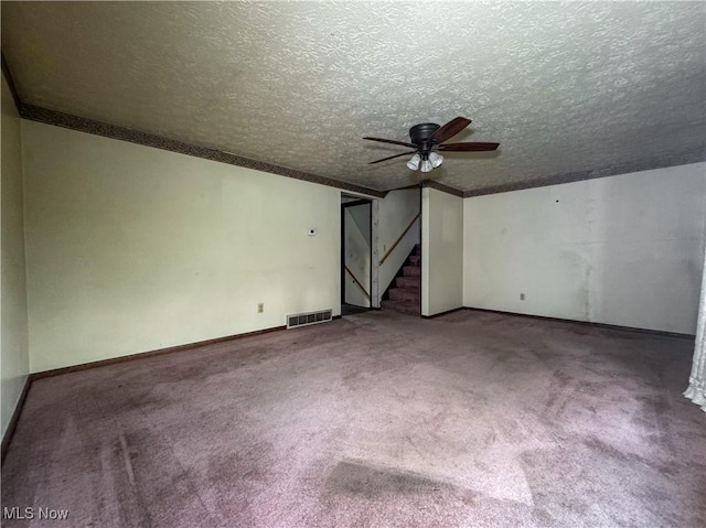 7918 State Route 164, Lisbon, OH 44432 - carpeted spare room with a ceiling fan, stairs, a textured ceiling, and crown molding