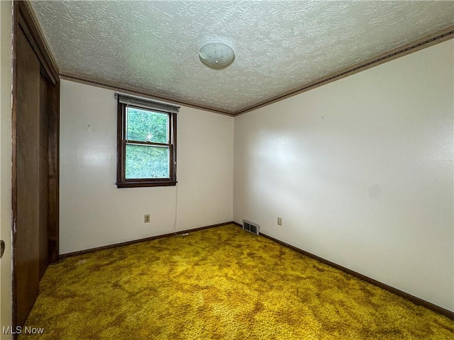 7918 State Route 164, Lisbon, OH 44432 - carpeted spare room with ornamental molding and a textured ceiling