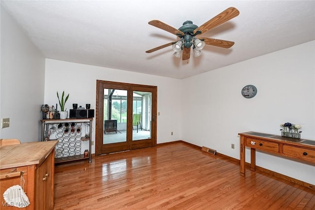 6111 State Route 82, Hiram, OH 44234 - interior space with light wood finished floors and ceiling fan