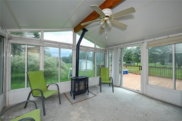 6111 State Route 82, Hiram, OH 44234 - sunroom featuring a ceiling fan and a wood stove