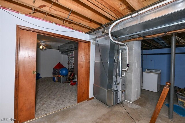 6111 State Route 82, Hiram, OH 44234 - unfinished below grade area featuring washer / dryer and heating unit