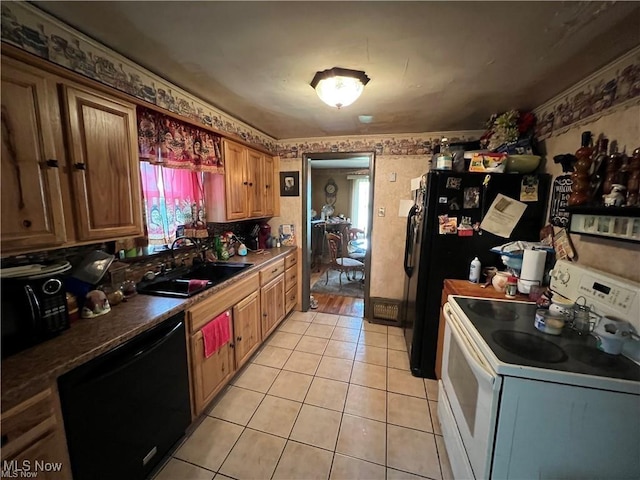 629 Willard Ave SE, Warren, OH 44483 - kitchen featuring electric stove, dishwashing machine, light tile patterned floors, wallpapered walls, and brown cabinetry