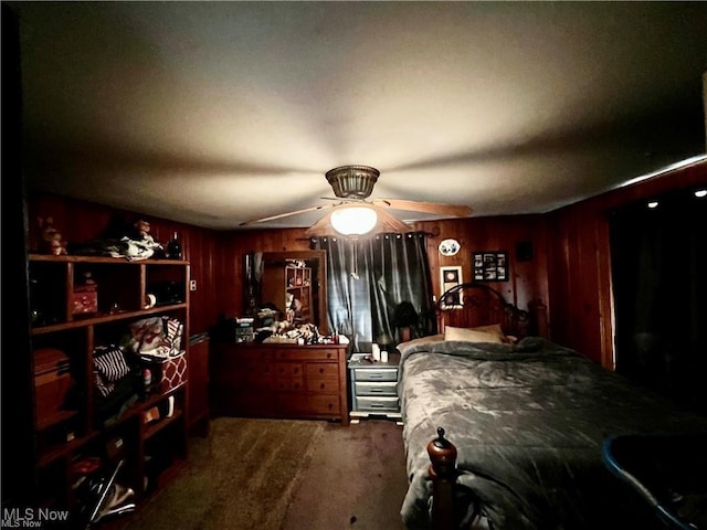 629 Willard Ave SE, Warren, OH 44483 - bedroom with carpet and wood walls