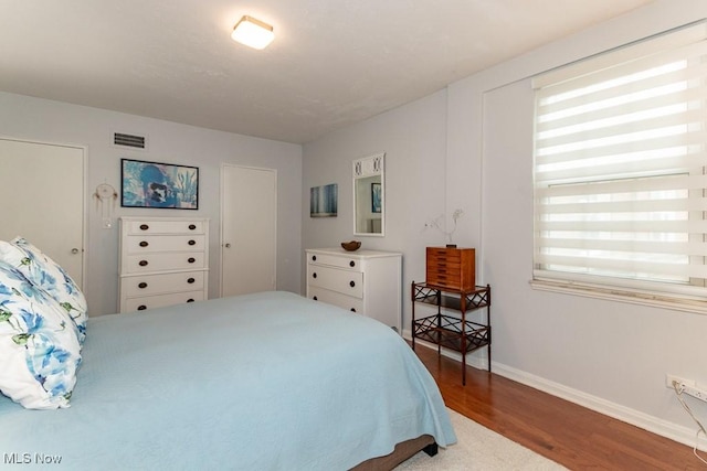 13800 Fairhill Rd Unit 206, Shaker Heights, OH 44120 - bedroom featuring wood finished floors and baseboards