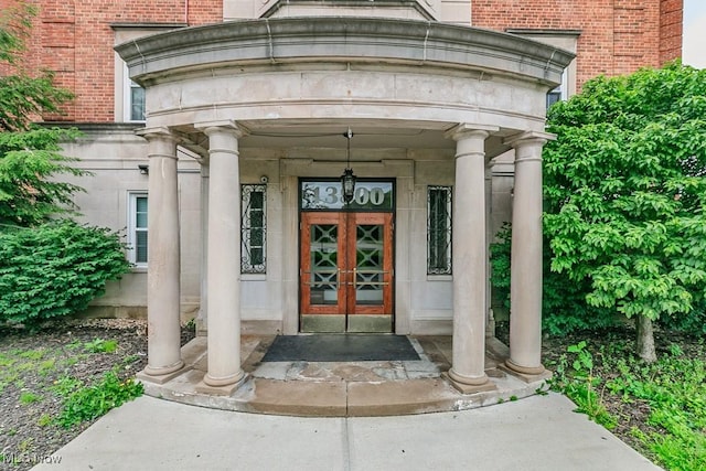 13800 Fairhill Rd Unit 206, Shaker Heights, OH 44120 - doorway to property featuring brick siding and french doors