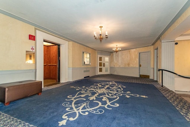 13800 Fairhill Rd Unit 206, Shaker Heights, OH 44120 - carpeted spare room with a chandelier, ornamental molding, and a wainscoted wall