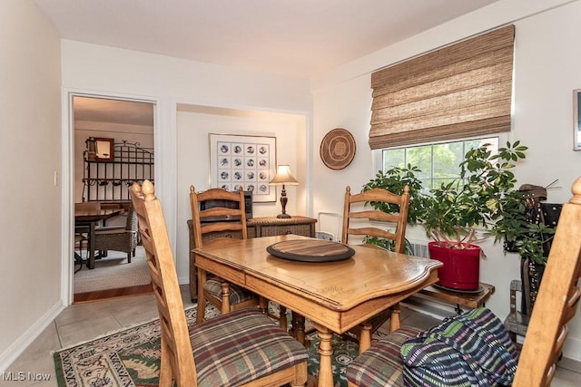 13800 Fairhill Rd Unit 206, Shaker Heights, OH 44120 - dining space with baseboards and light tile patterned floors