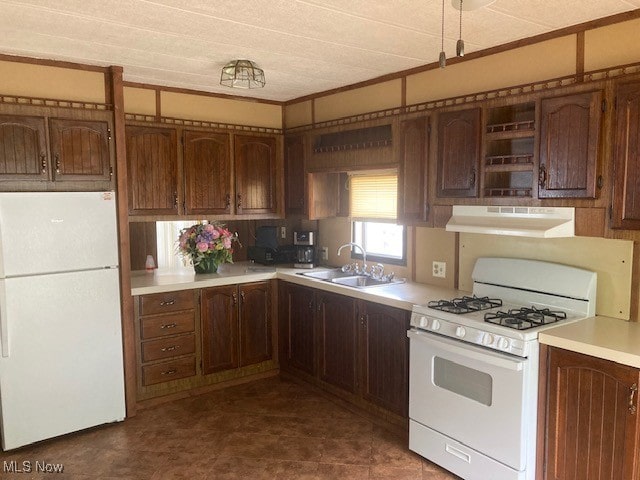 129 Bennett, Vienna, OH 44473 - kitchen with white appliances, under cabinet range hood, light countertops, and open shelves