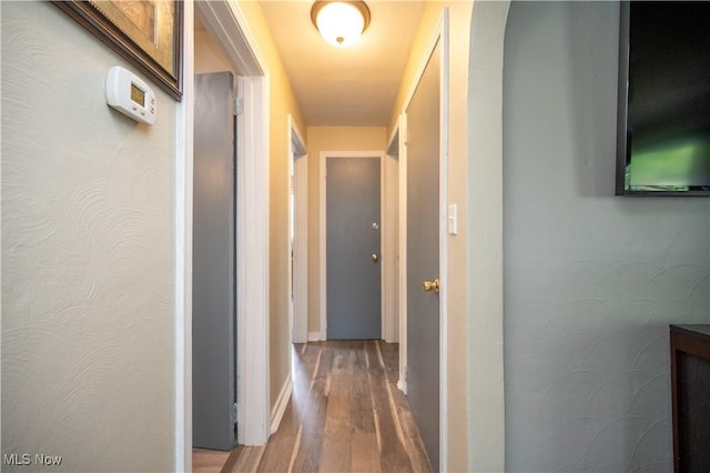 1432 Maxwell Ave NW, Warren, OH 44485 - corridor featuring wood finished floors and baseboards