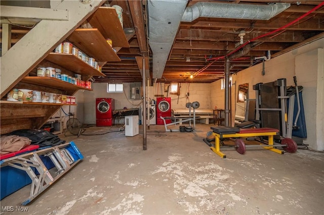1432 Maxwell Ave NW, Warren, OH 44485 - below grade area featuring electric panel and washer / clothes dryer