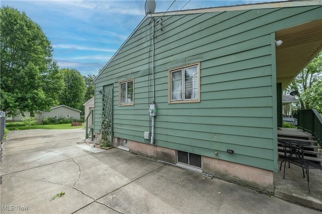 1432 Maxwell Ave NW, Warren, OH 44485 - view of property exterior with a patio area