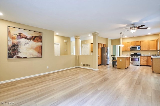 2683 High Hampton Trl, Cuyahoga Falls, OH 44223 - kitchen featuring appliances with stainless steel finishes, recessed lighting, light countertops, a center island, and ceiling fan
