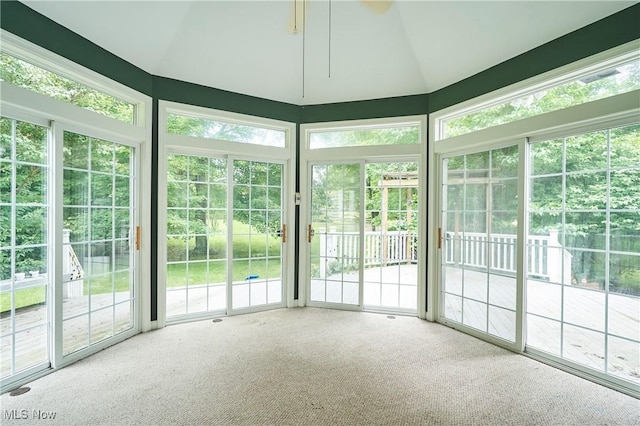2683 High Hampton Trl, Cuyahoga Falls, OH 44223 - unfurnished sunroom featuring carpet, vaulted ceiling, and plenty of natural light