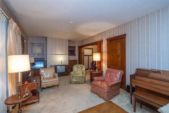 11604 Thornwood Ave, Cleveland, OH 44108 - living area with wallpapered walls
