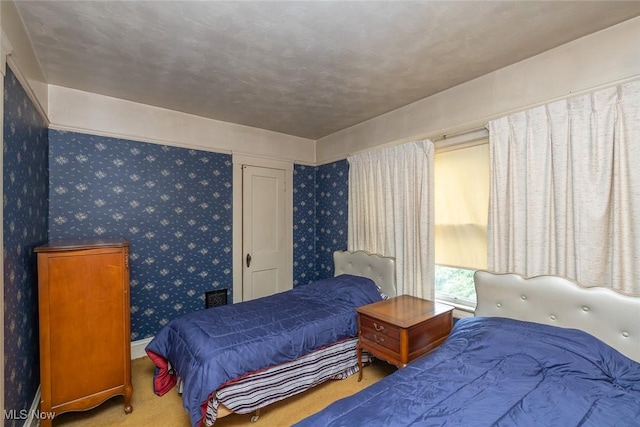 11604 Thornwood Ave, Cleveland, OH 44108 - bedroom featuring wallpapered walls and carpet flooring