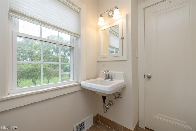 36 Rosedale Blvd, Norwalk, OH 44857 - bathroom with healthy amount of natural light and tile patterned floors