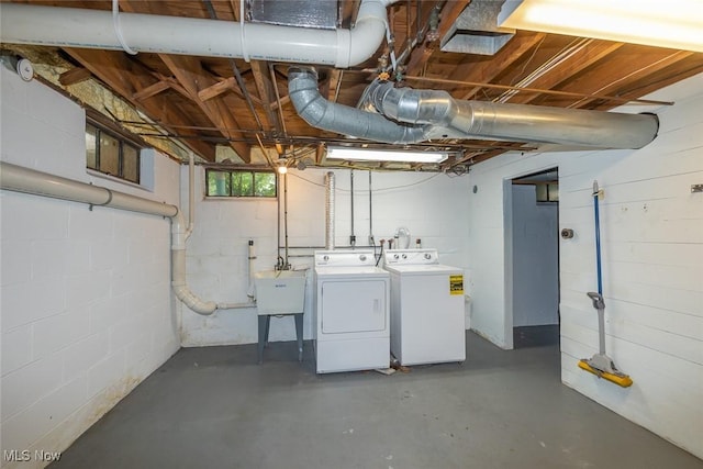 36 Rosedale Blvd, Norwalk, OH 44857 - below grade area featuring separate washer and dryer and concrete block wall