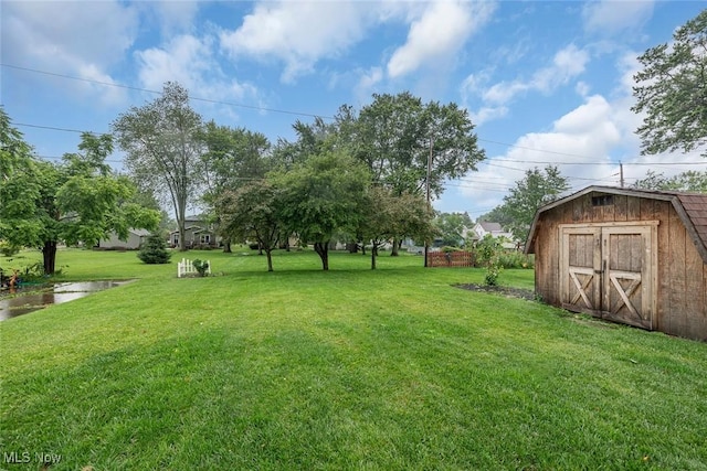 36 Rosedale Blvd, Norwalk, OH 44857 - view of grassy yard with a shed