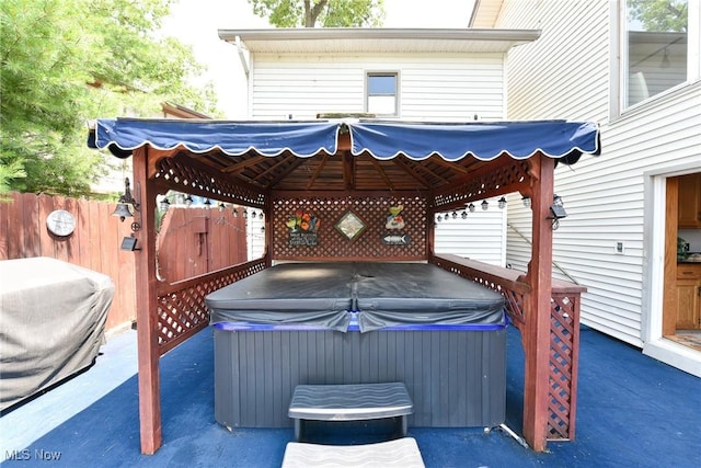 3568 Peninsula Dr, Coventry, OH 44319 - view of patio / terrace featuring a hot tub and a gazebo