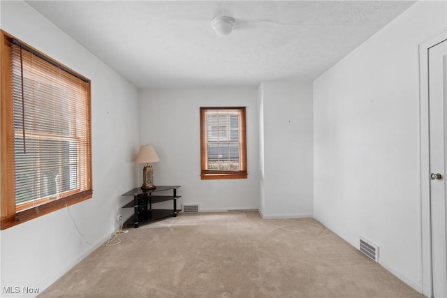 3568 Peninsula Dr, Coventry, OH 44319 - spare room featuring carpet flooring