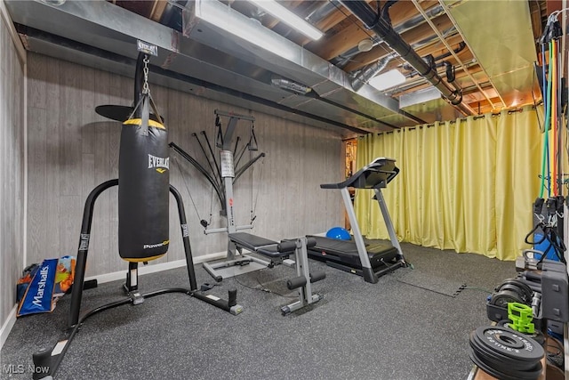 905 Braemar Cir, North Canton, OH 44720 - exercise room featuring wooden walls
