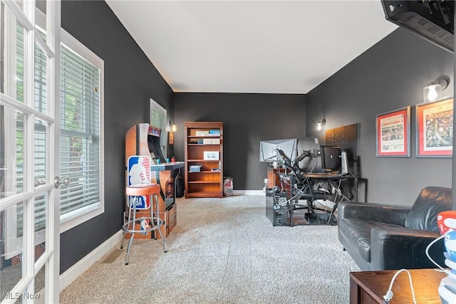 905 Braemar Cir, North Canton, OH 44720 - living area with carpet flooring, plenty of natural light, and an office area
