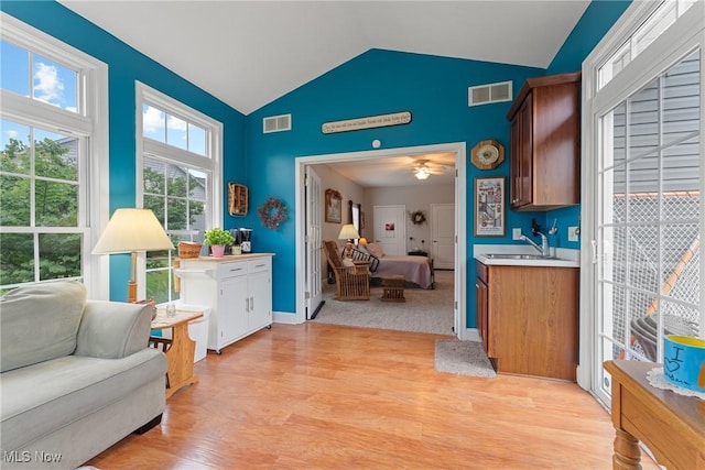 905 Braemar Cir, North Canton, OH 44720 - sitting room featuring vaulted ceiling, light wood finished floors, and a ceiling fan