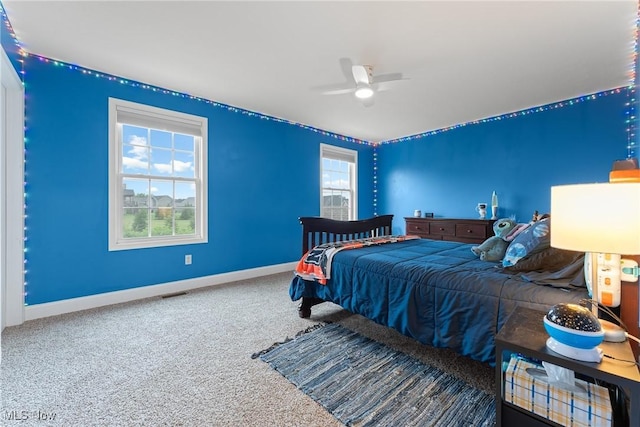 905 Braemar Cir, North Canton, OH 44720 - bedroom with carpet flooring and ceiling fan