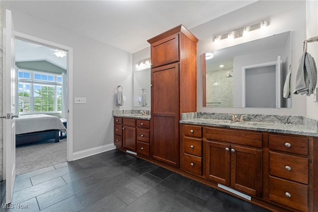 905 Braemar Cir, North Canton, OH 44720 - ensuite bathroom featuring vanity, walk in shower, a ceiling fan, and lofted ceiling
