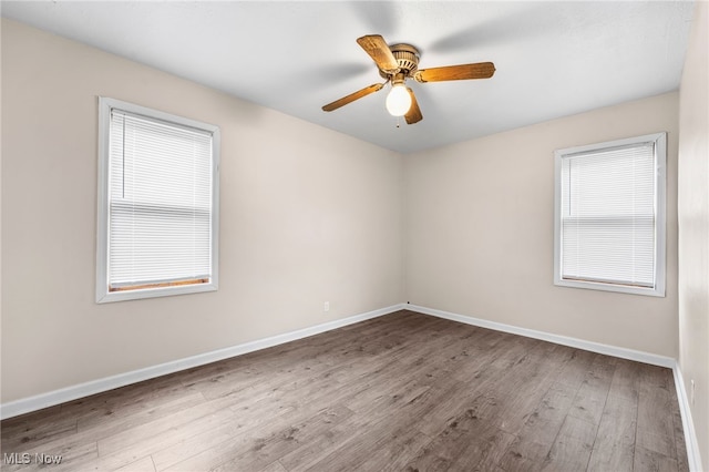 907 Hillsdale Ave, Parma, OH 44134 - unfurnished room with wood finished floors and ceiling fan