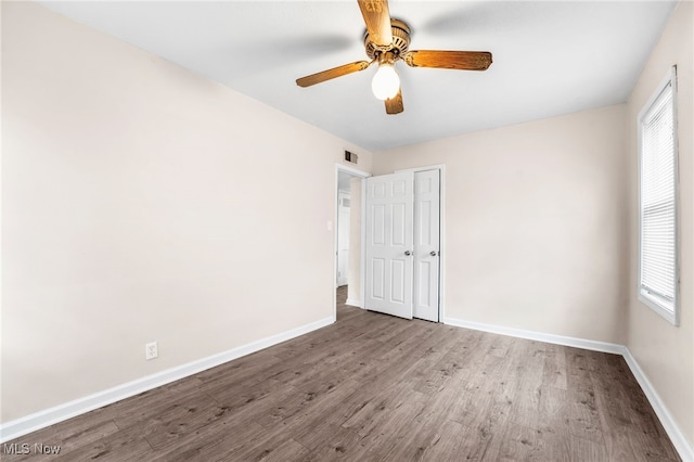 907 Hillsdale Ave, Parma, OH 44134 - empty room with wood finished floors and ceiling fan